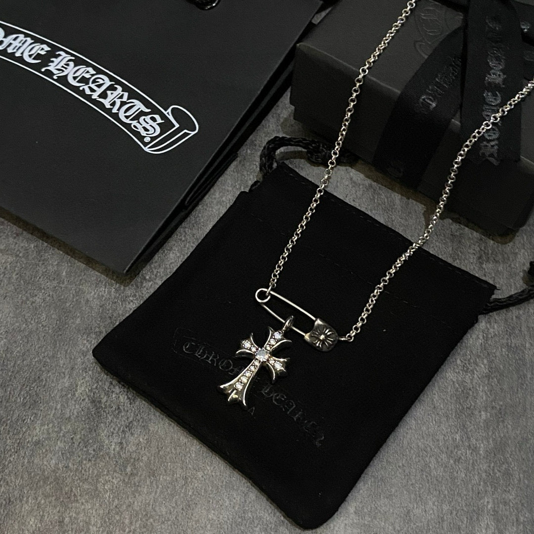 Signature Emblem Crystal-Accent Pendant Necklace – Red Detail close-up detail