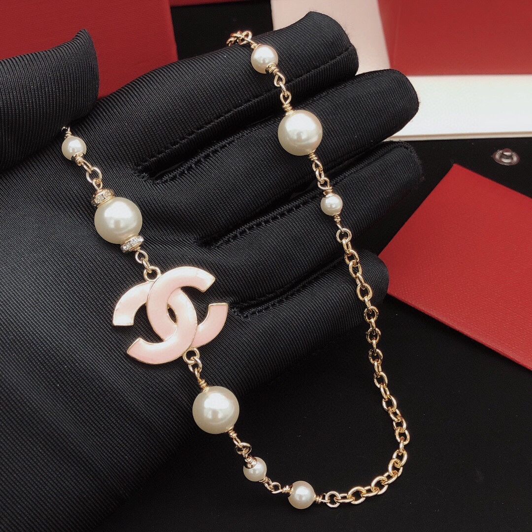 Signature Emblem Pendant Necklace in Gold-Tone – Pink Detail – Design 005 front product view
