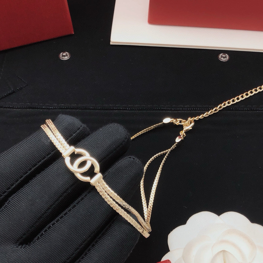 Signature Emblem Pendant Necklace in Gold-Tone – Design 038 close-up detail