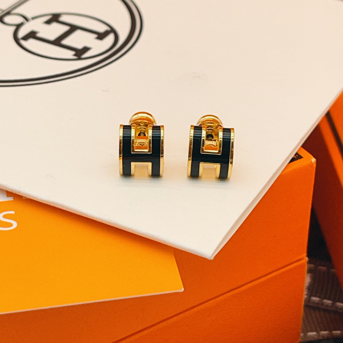 Geometric Emblem Stud Earrings in Gold-Tone – Gold Detail close-up detail