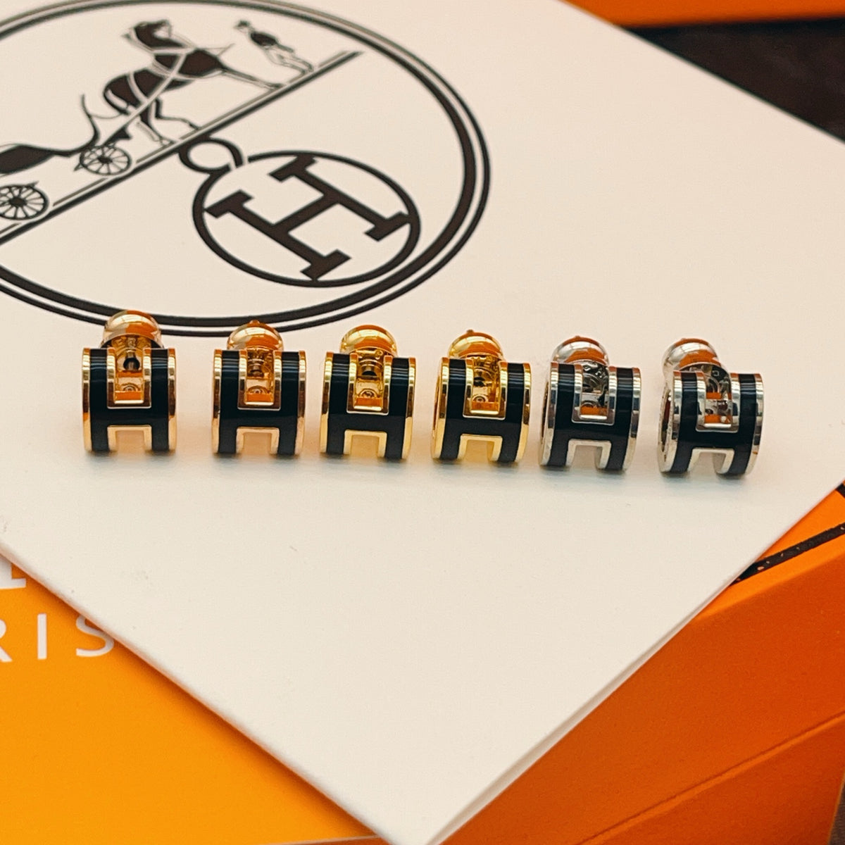 Geometric Emblem Stud Earrings in Gold-Tone – Gold Detail close-up detail