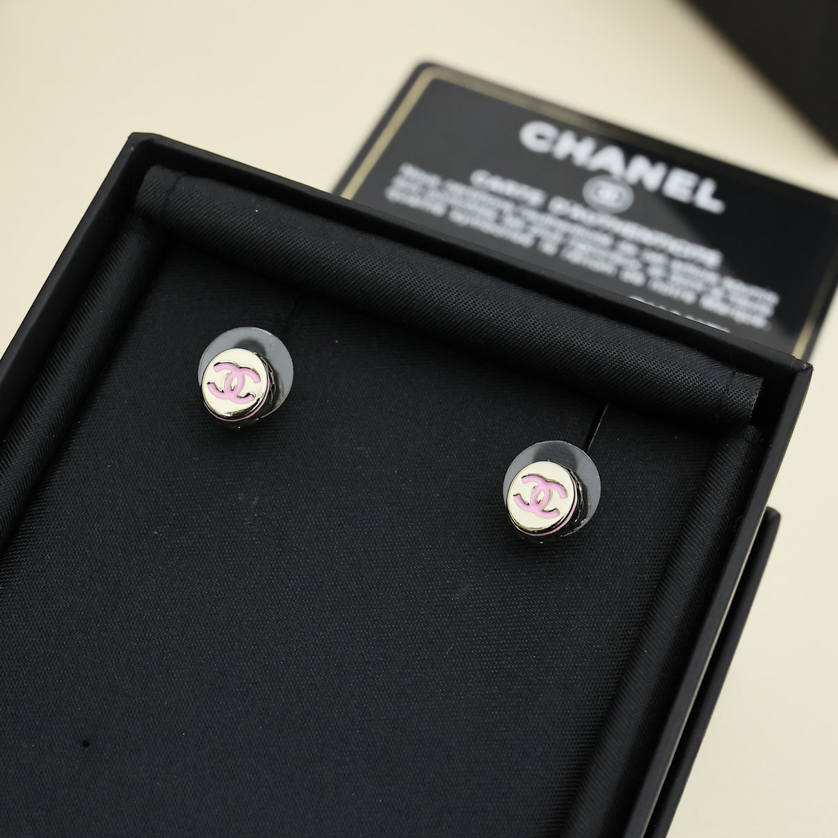Signature Emblem Stud Earrings in Polished Metal-Tone – Pink Detail close-up detail