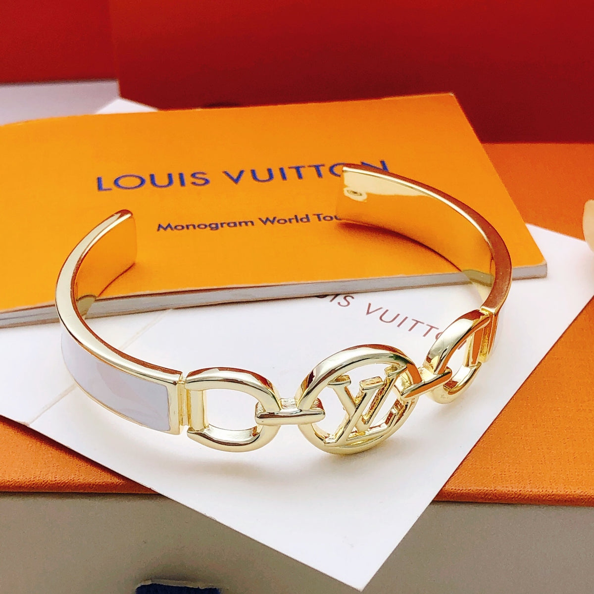 Geometric Emblem Bangle in Gold-Tone – White Detail detail view