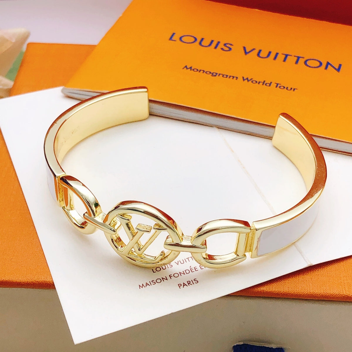 Geometric Emblem Bangle in Gold-Tone – White Detail front product view