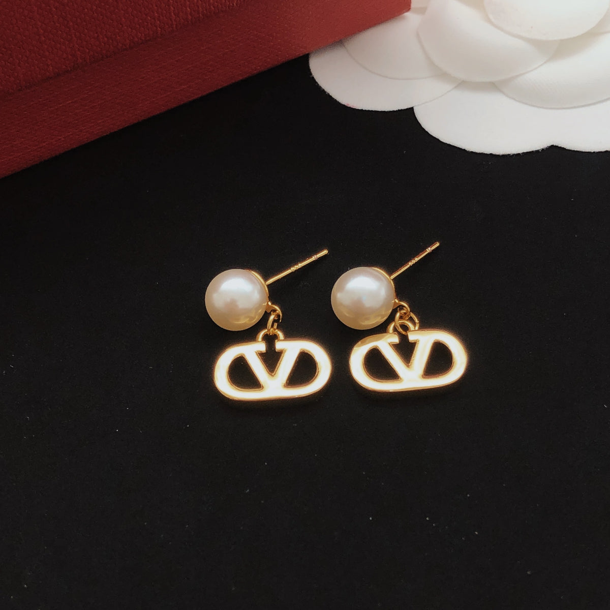 Signature Emblem Polished Stud Earrings – Design 05 styled detail