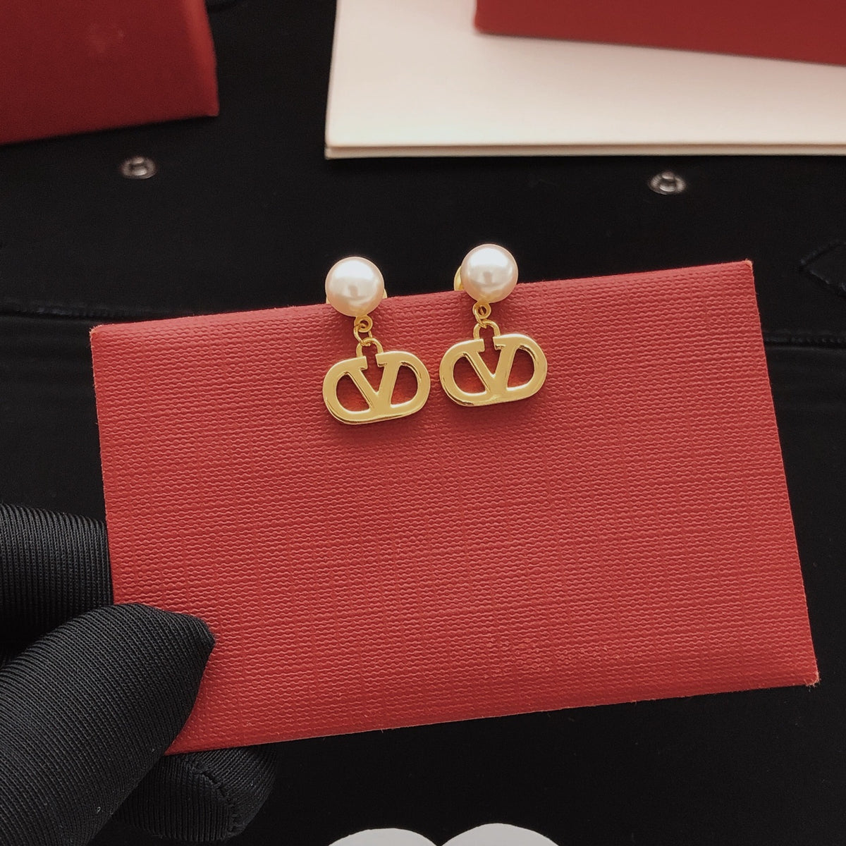 Signature Emblem Polished Stud Earrings – Design 05 front view