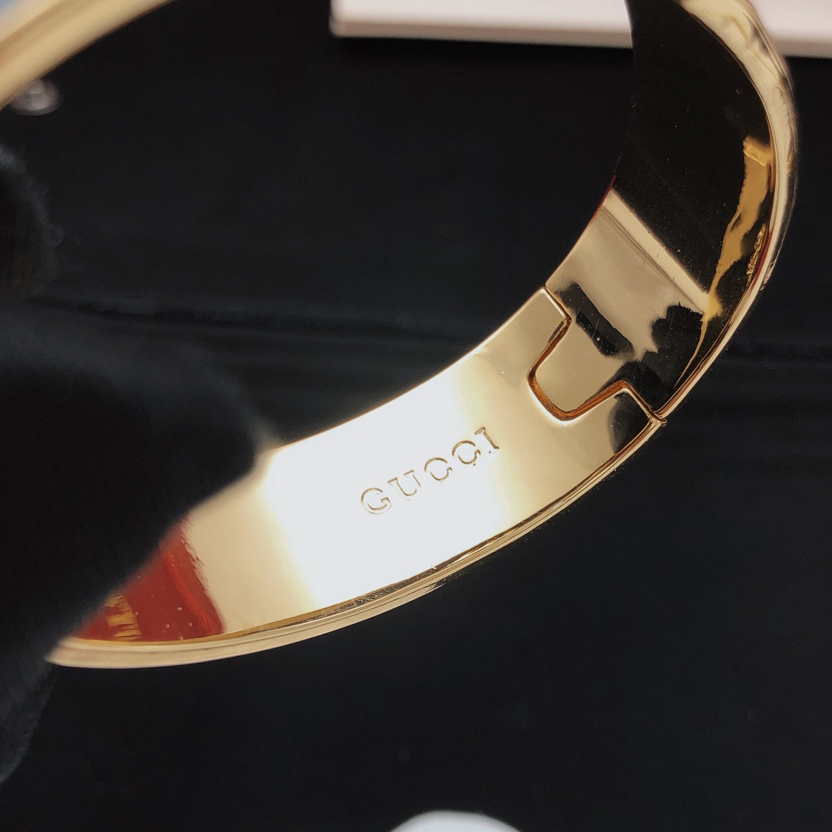 Geometric Emblem Bangle in Gold-Tone – Black Detail side detail