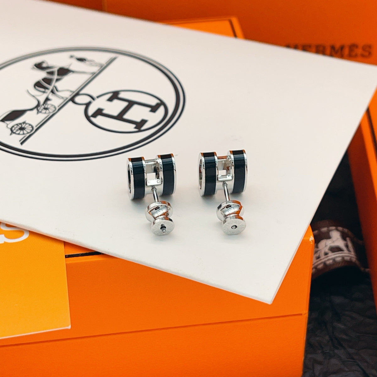 Geometric Emblem Stud Earrings in Silver-Tone detail view