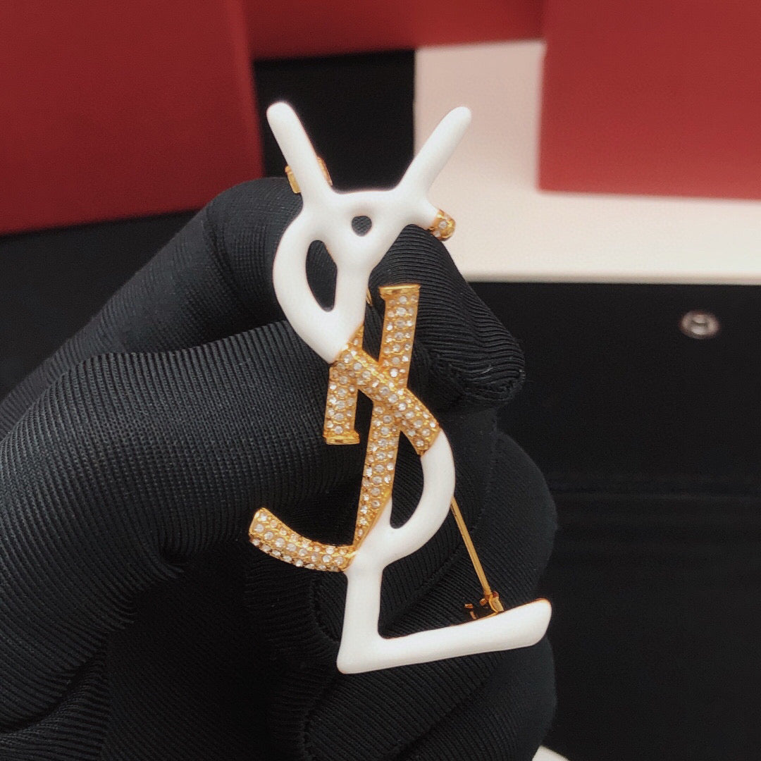 Geometric Emblem Brooch in Gold-Tone – White Detail main product view