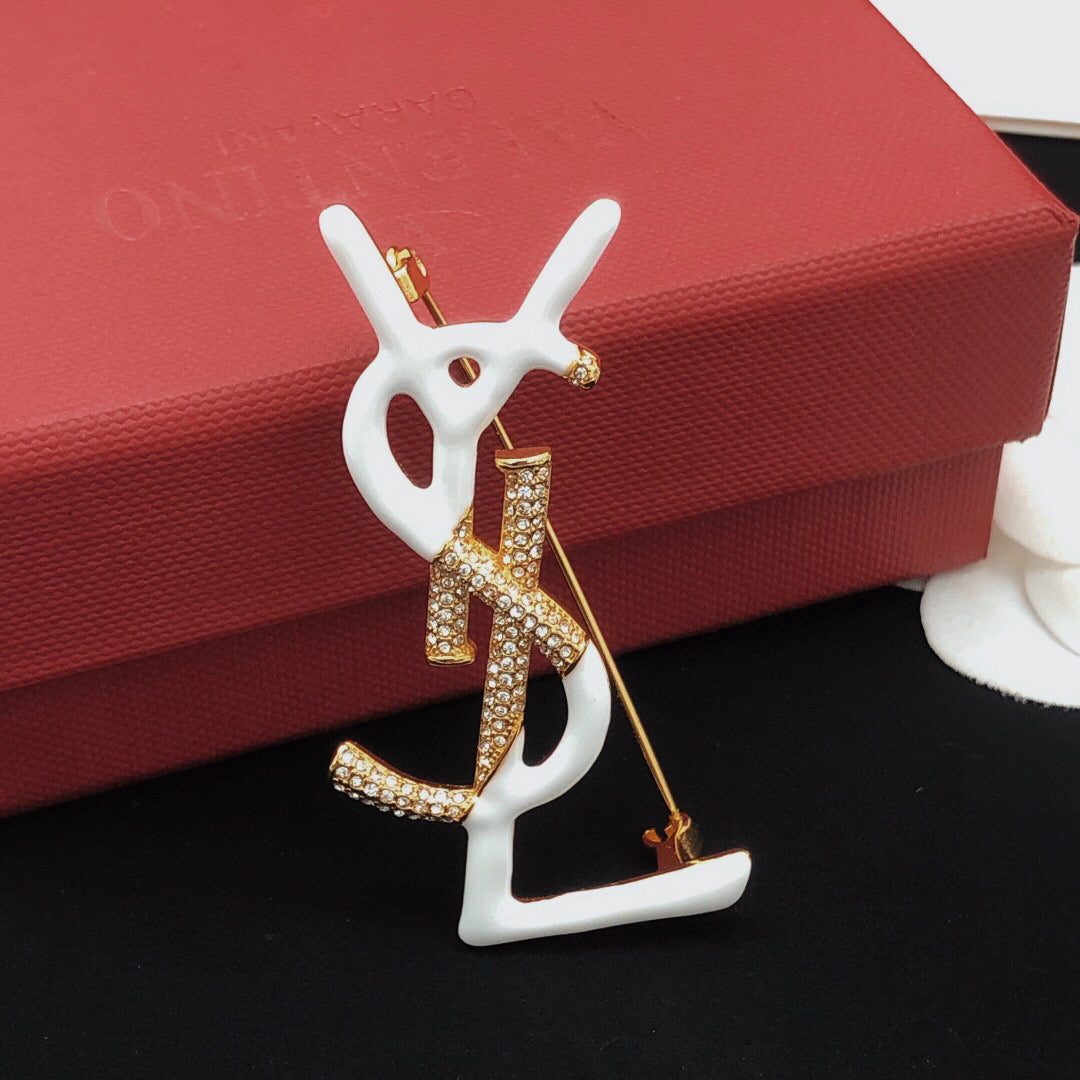 Geometric Emblem Brooch in Gold-Tone – White Detail front product view