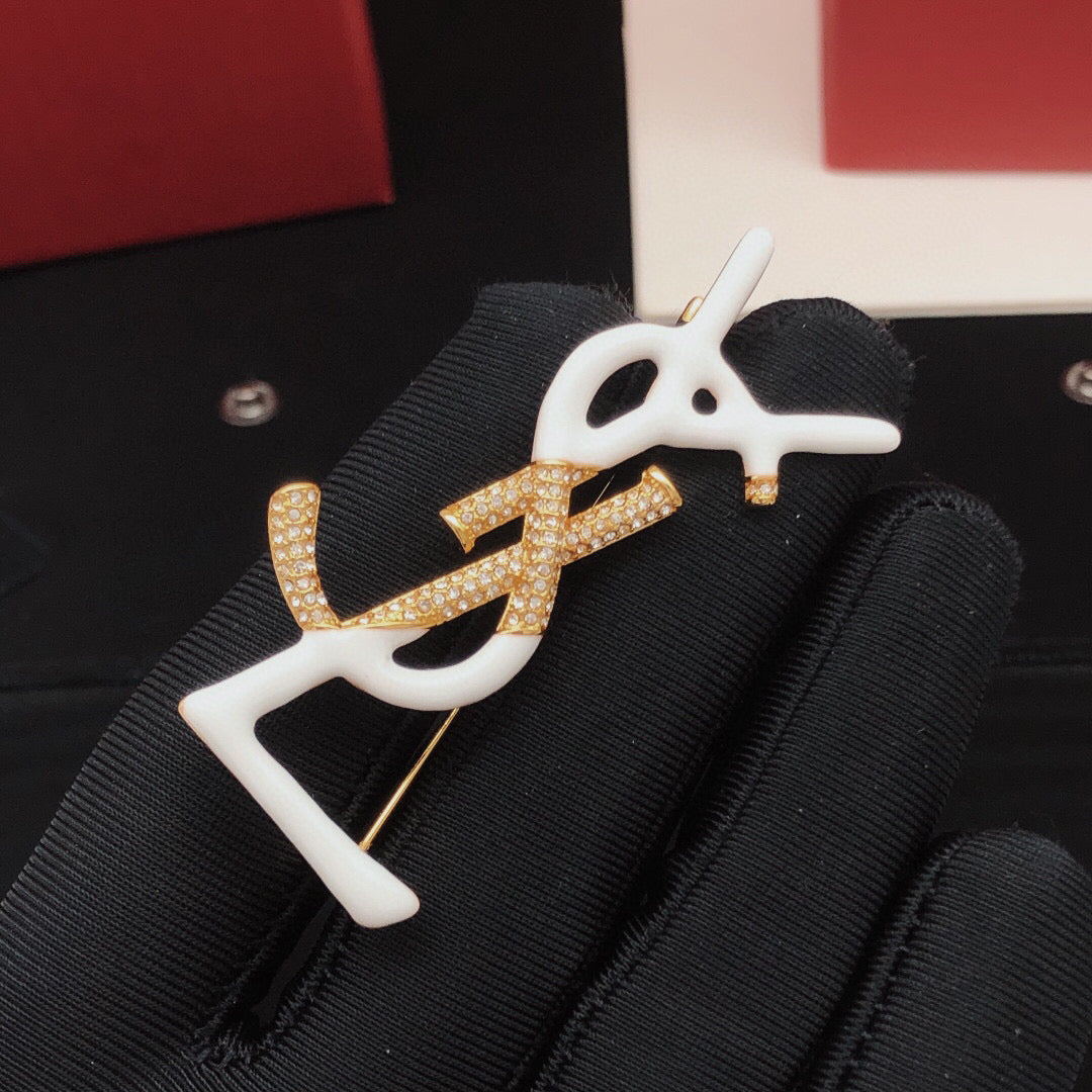 Geometric Emblem Brooch in Gold-Tone – White Detail front product view