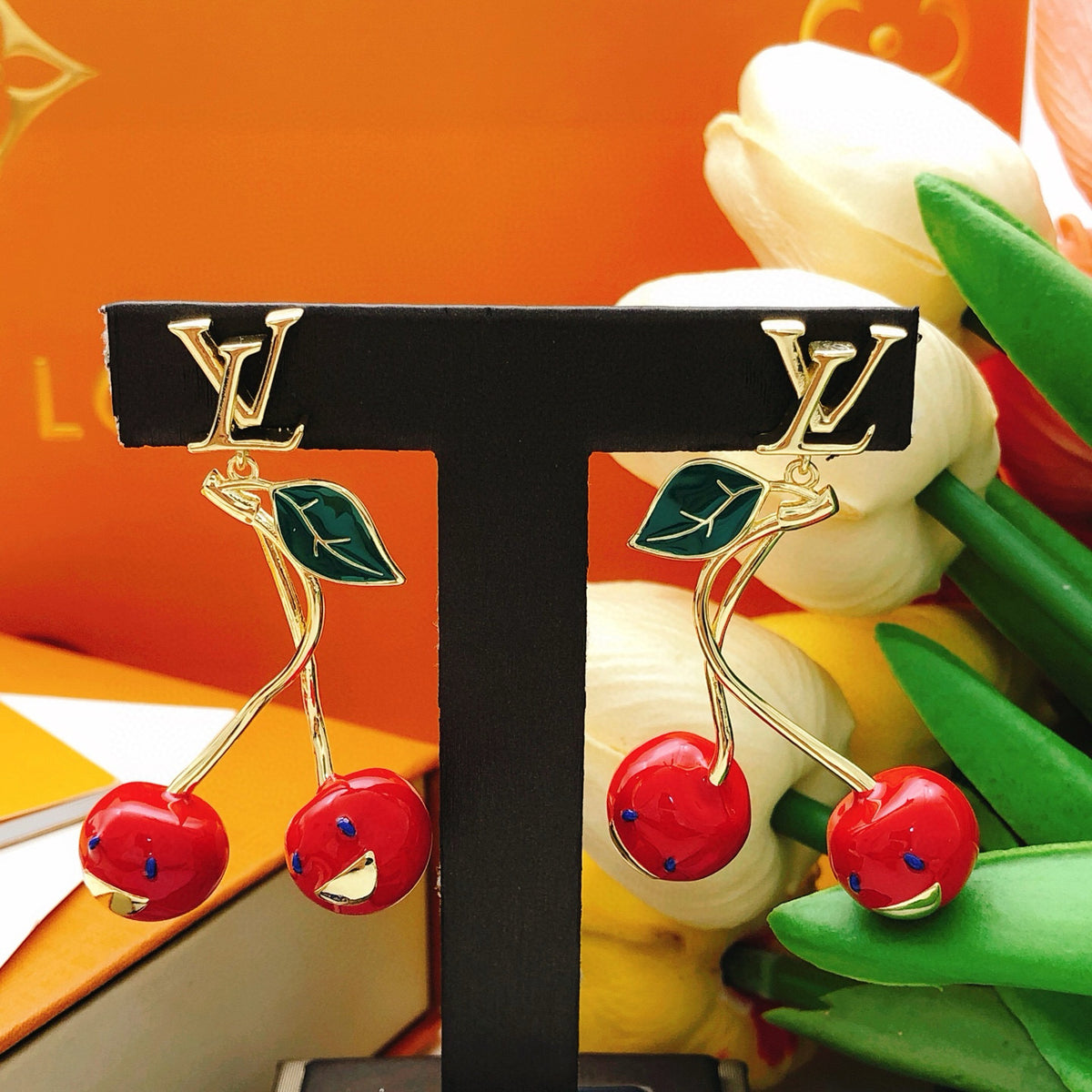 Geometric Emblem Stud Earrings in Gold-Tone – Red Detail close-up detail
