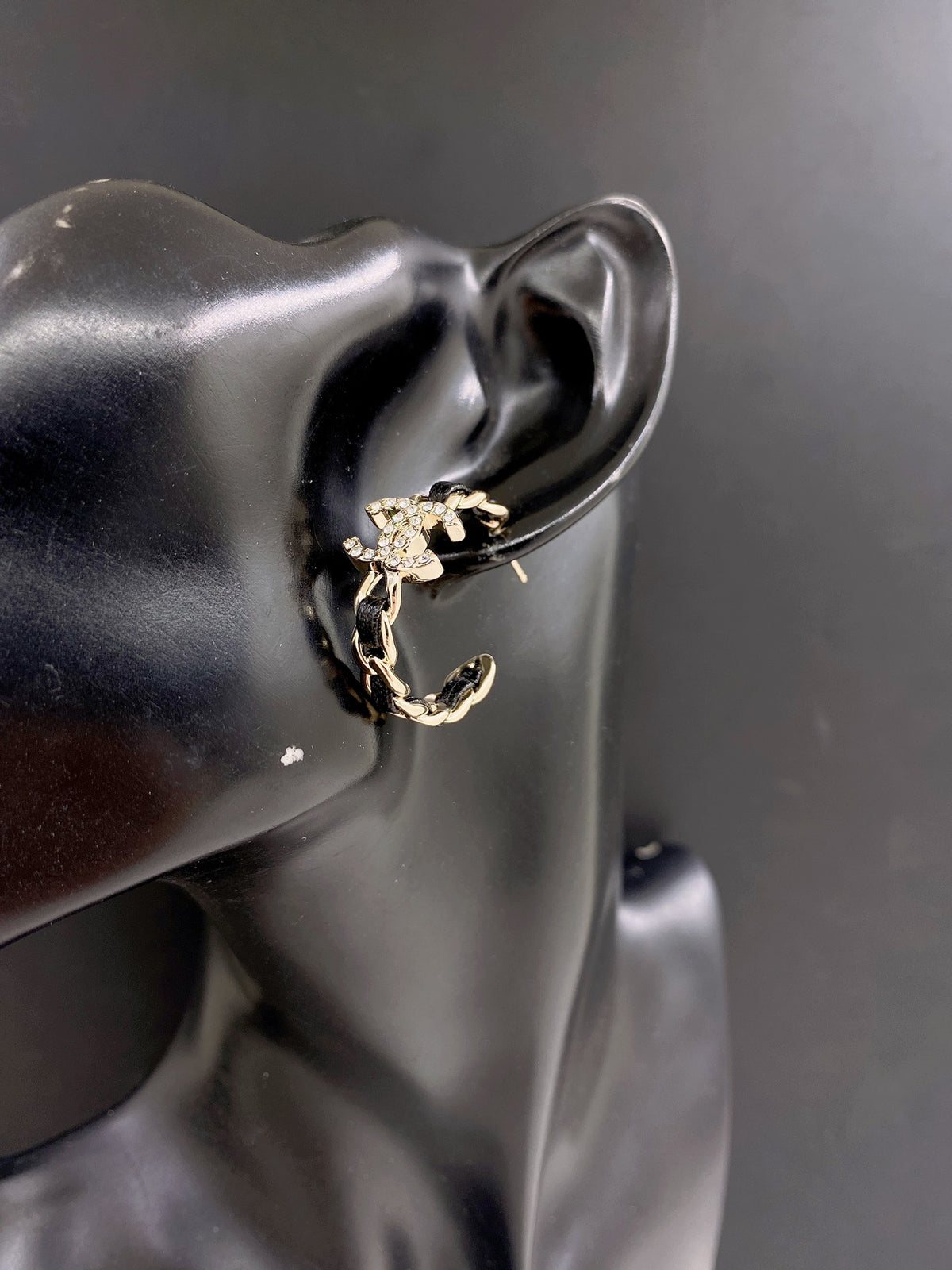 Signature Emblem Jewelry Accessory in Gold-Tone – Black Detail front product view