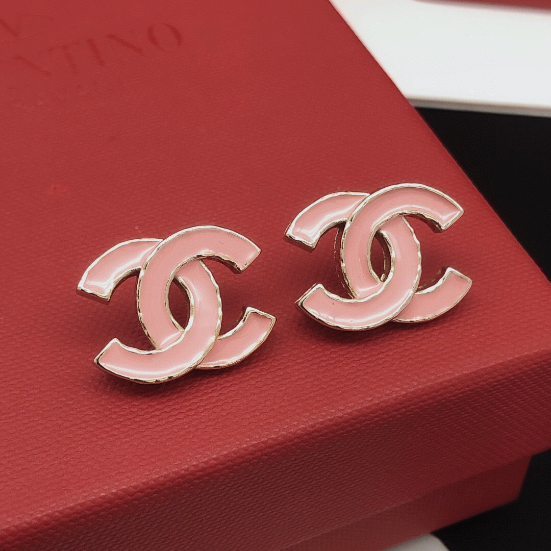 Signature Emblem Stud Earrings in Gold-Tone – Pink Detail close-up detail