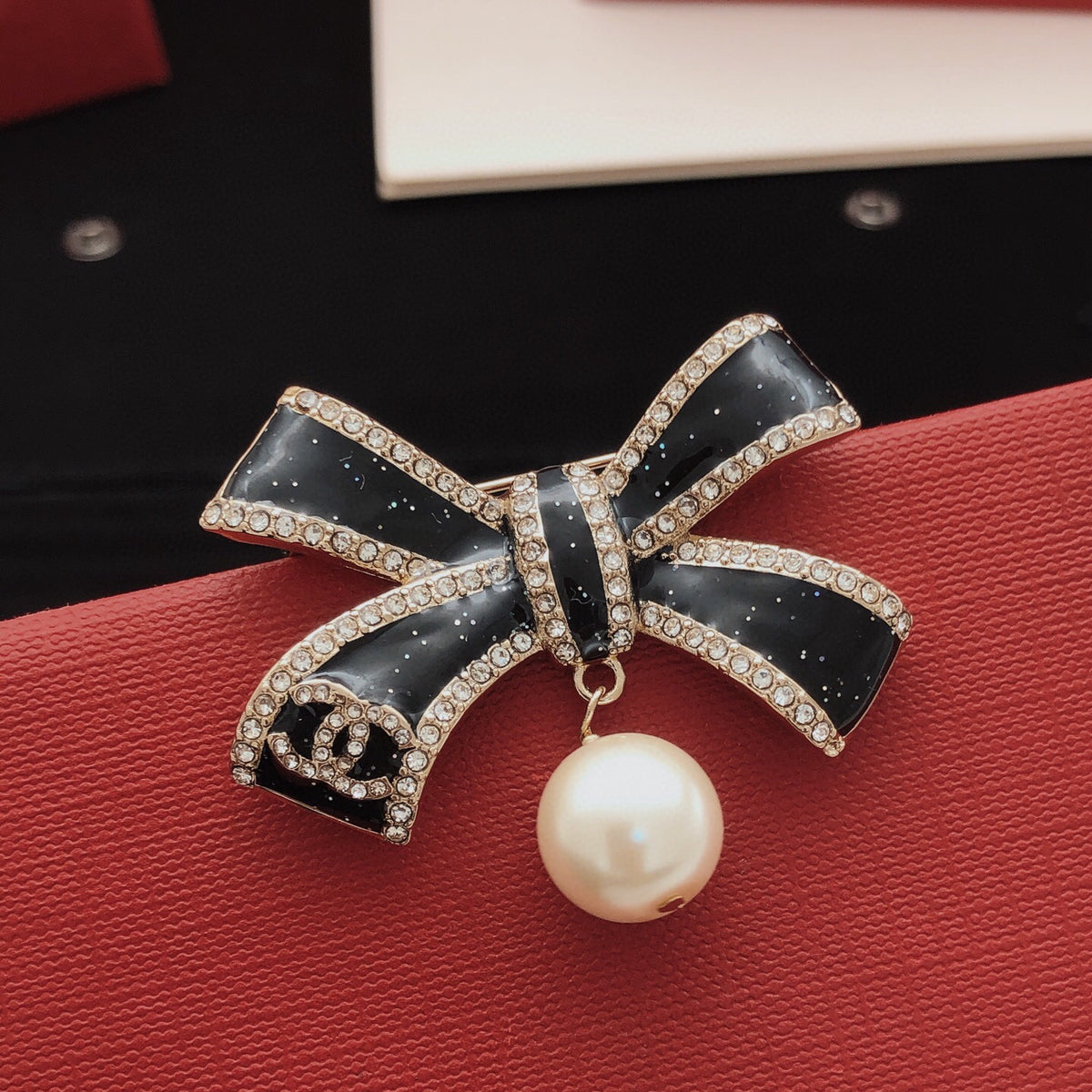 Bow Brooch in Gold-Tone – Black Detail main product view