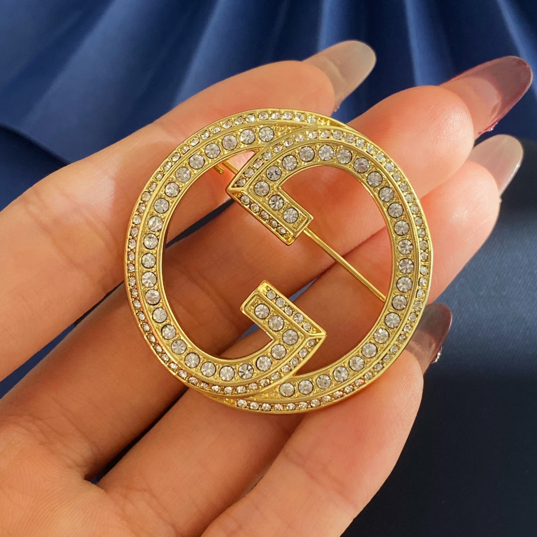 Double-G Emblem Brooch in Gold-Tone – Crystal Detail – Design 002 styled product view
