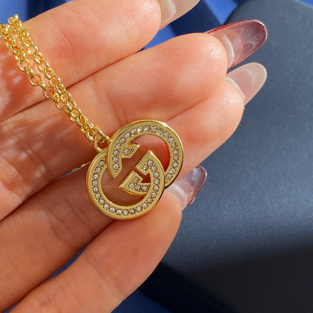 Double-G Emblem Brooch in Gold-Tone – Crystal Detail – Design 004 front product view