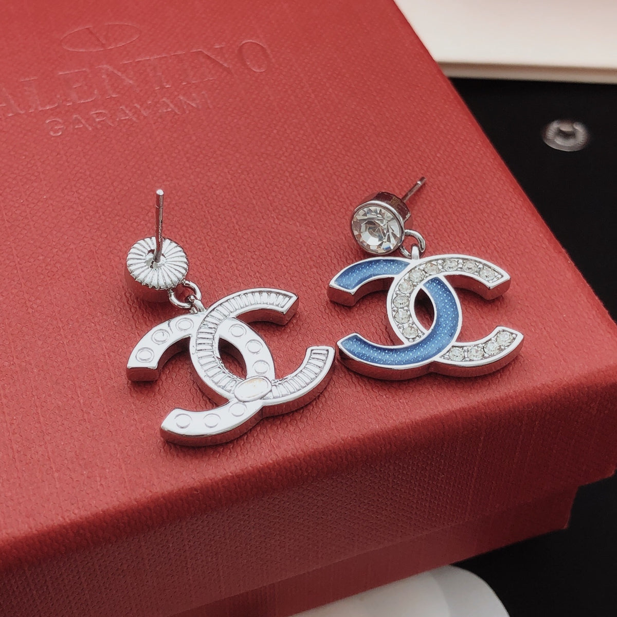 Signature Emblem Stud Earrings in Gold-Tone – Blue Detail close-up detail