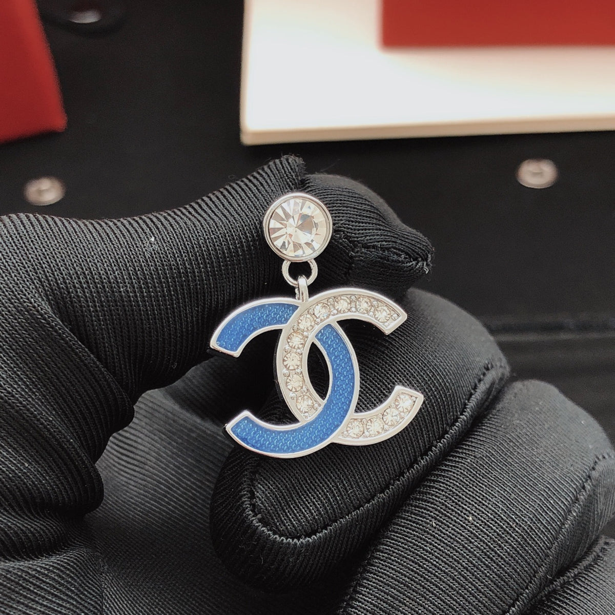 Signature Emblem Stud Earrings in Gold-Tone – Blue Detail front product view