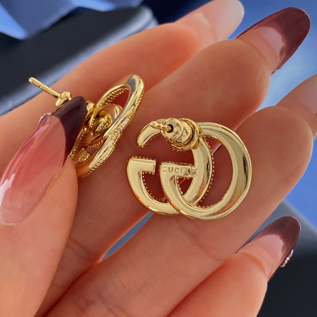 Double-G Emblem Stud Earrings in Gold-Tone – Design 005 detail view