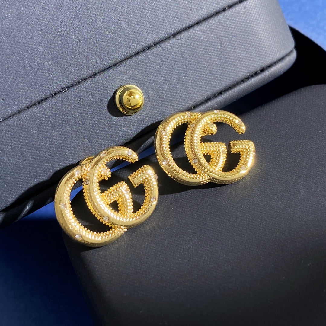 Double-G Emblem Stud Earrings in Gold-Tone – Design 005 front product view