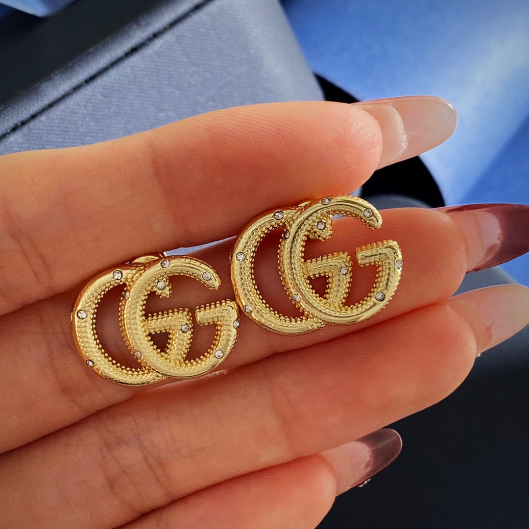 Double-G Emblem Stud Earrings in Gold-Tone – Design 005 styled product view