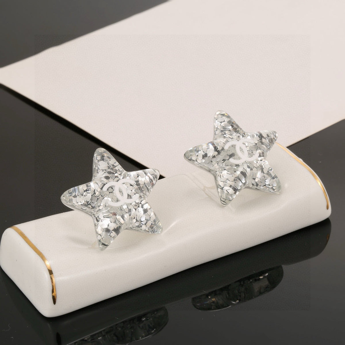 Double-C Emblem Stud Earrings in Silver-Tone – Star Detail – Design 004 detail view