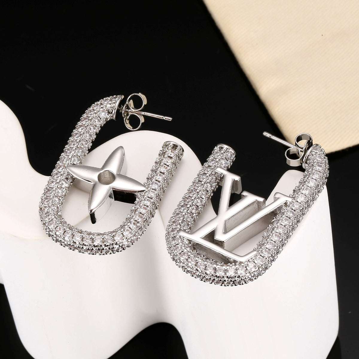 Letter Emblem Stud Earrings in Polished Metal-Tone – Design 016 detail view