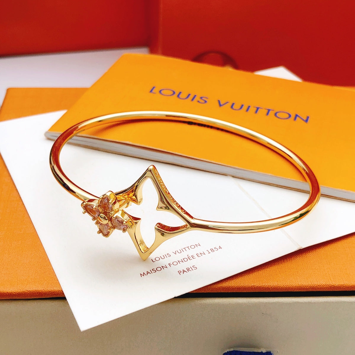 Geometric Emblem Bangle in Gold-Tone – Pink Detail side detail