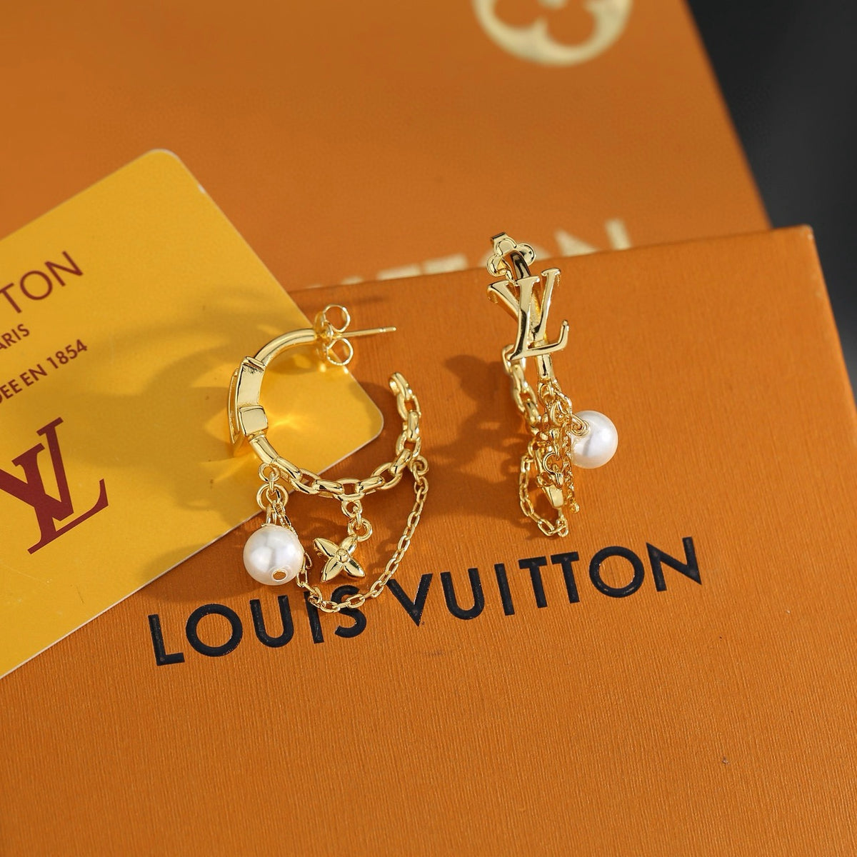 Letter Emblem Stud Earrings in Polished Metal-Tone – Design 015 front product view
