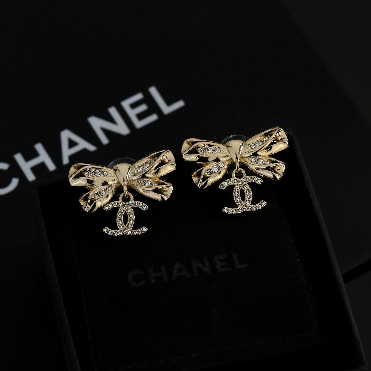 Double-C Emblem Stud Earrings in Polished Metal-Tone – Design 185 front product view