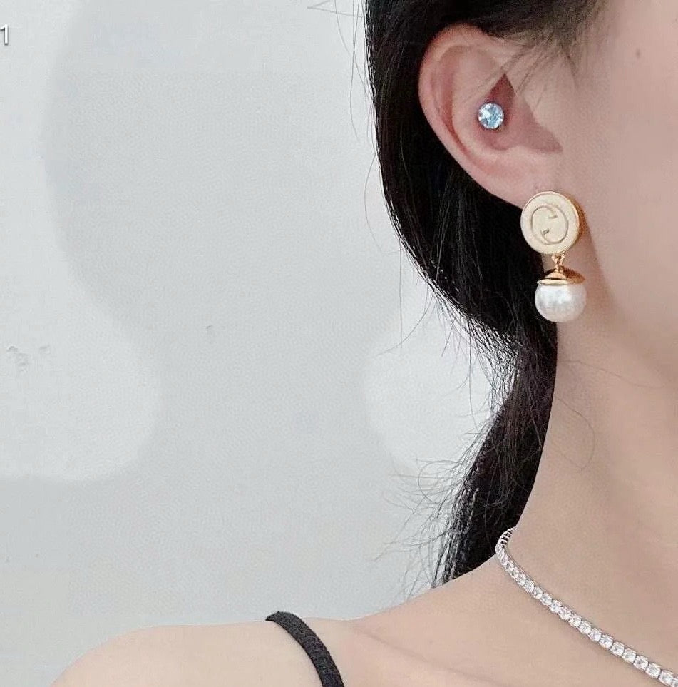 Geometric Emblem Stud Earrings in Polished Metal-Tone – Design 029 detail view