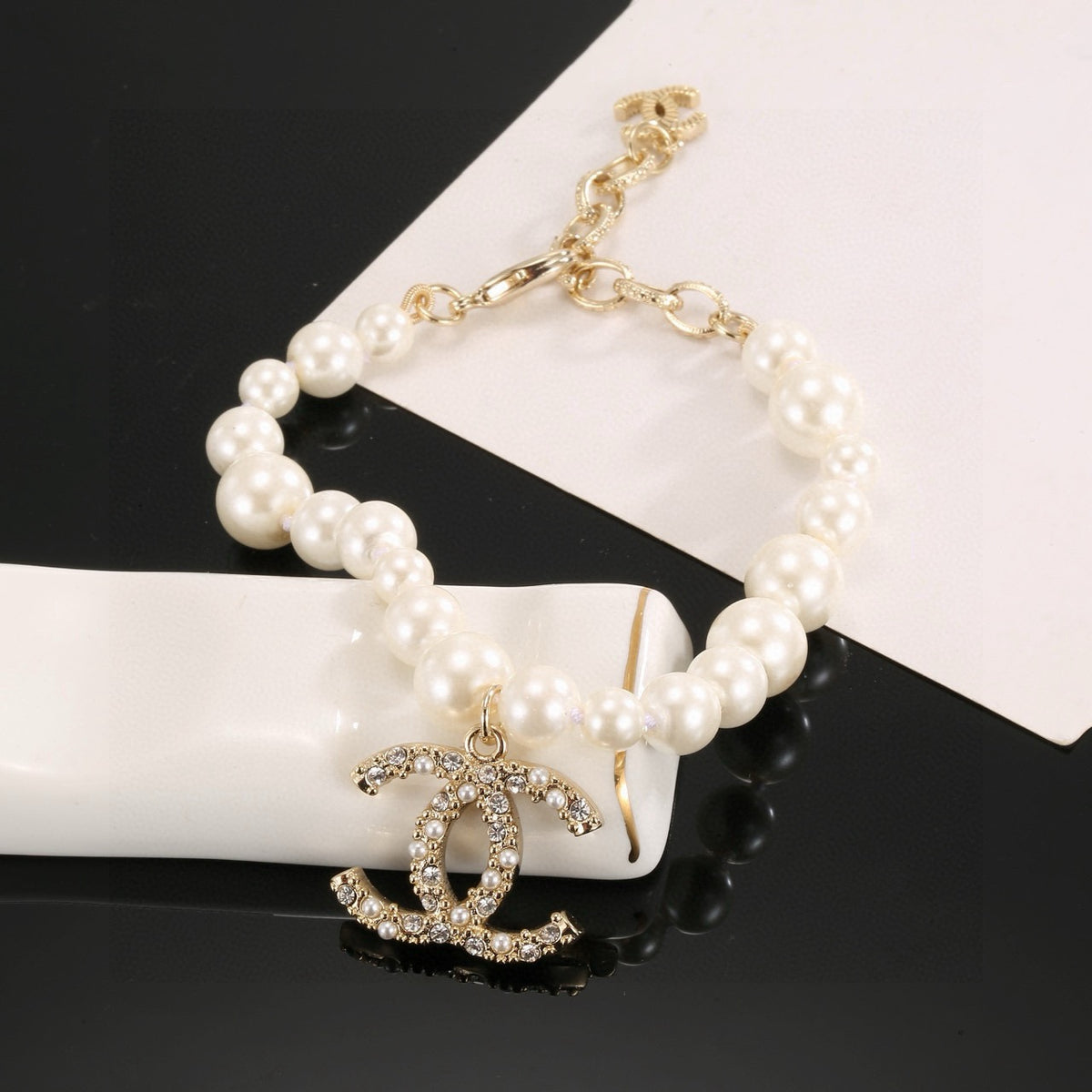 Double-C Emblem Bracelet in Gold-Tone – Pearl Detail – Design 003 side detail