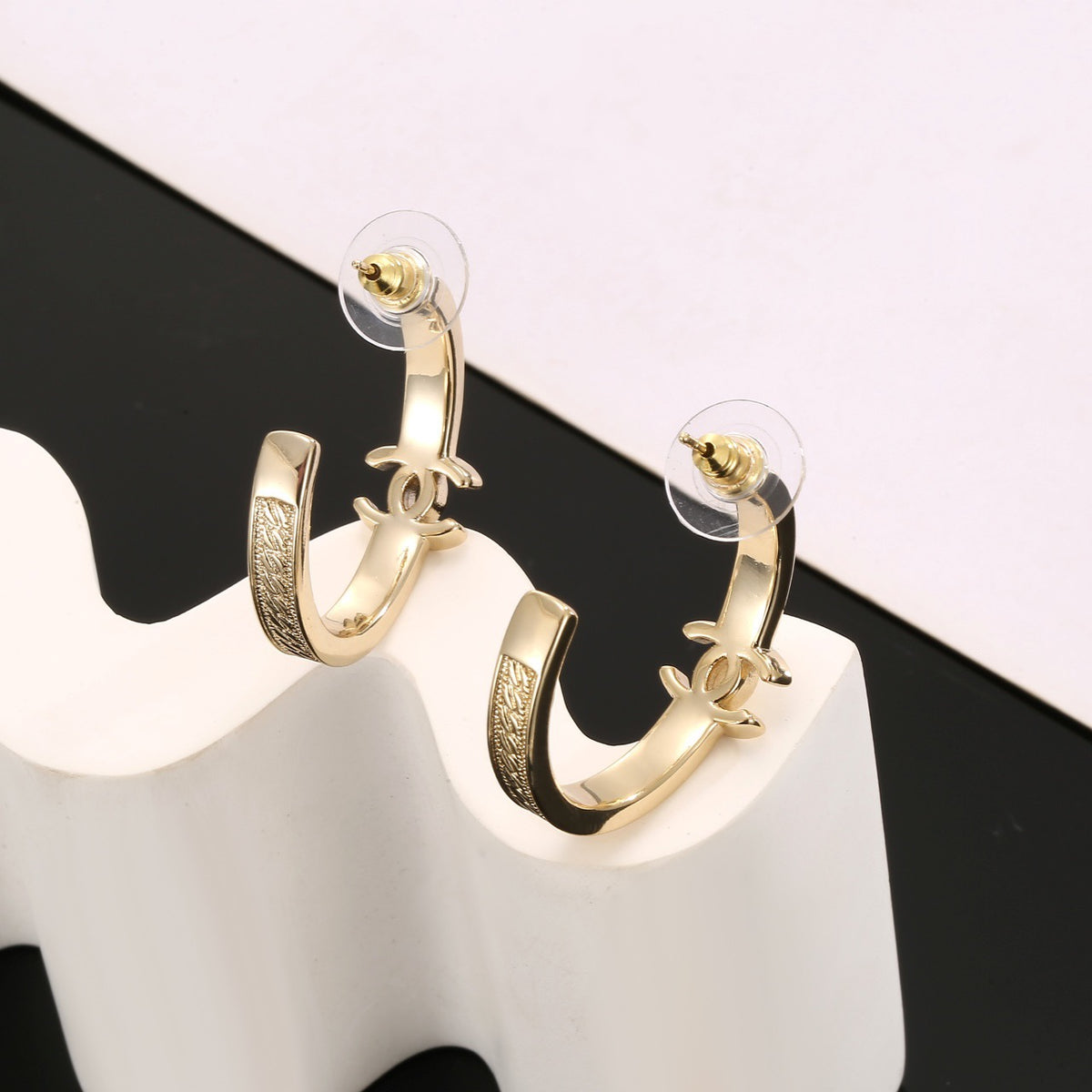 Signature Emblem Stud Earrings in Polished Metal-Tone – Design 018 close-up detail