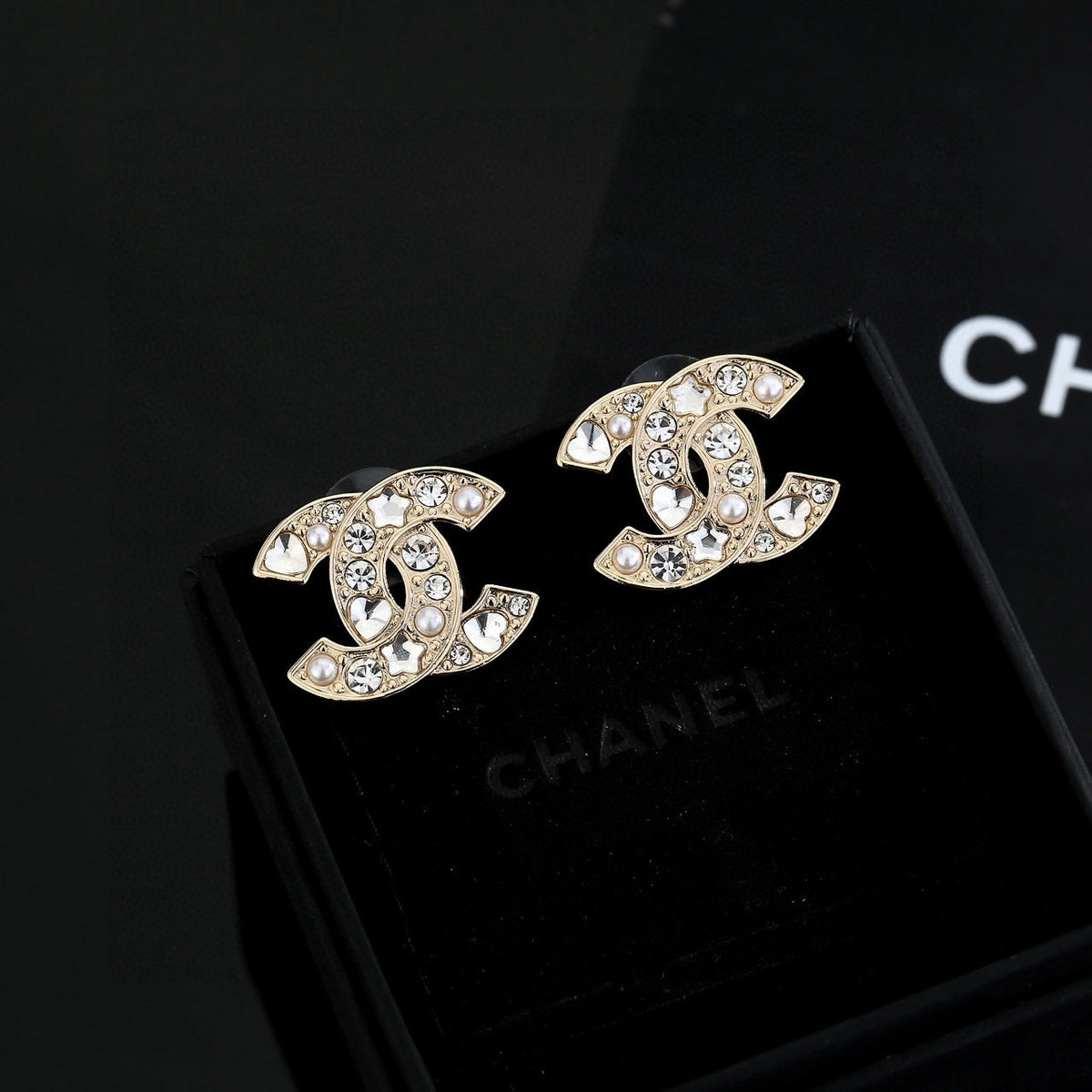 Double-C Emblem Stud Earrings in Gold-Tone – Star Detail – Design 004 front product view