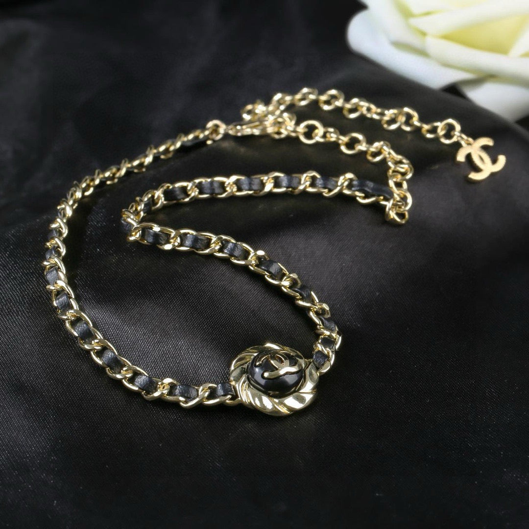 Double-C Emblem Pendant Necklace in Gold-Tone – Black Detail detail view