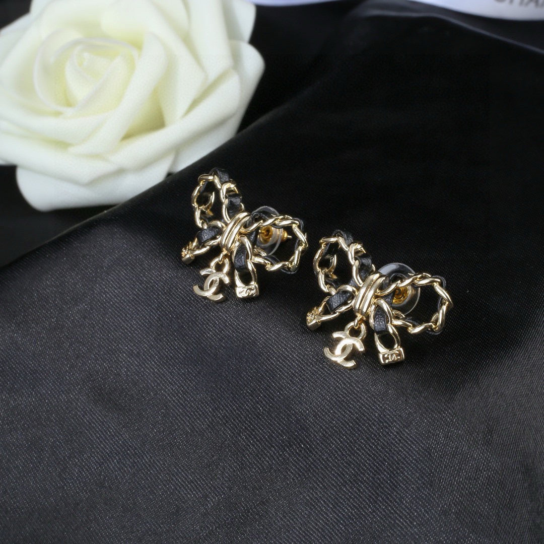 Bow Statement Earrings in Polished Metal-Tone – Design 002 styled product view