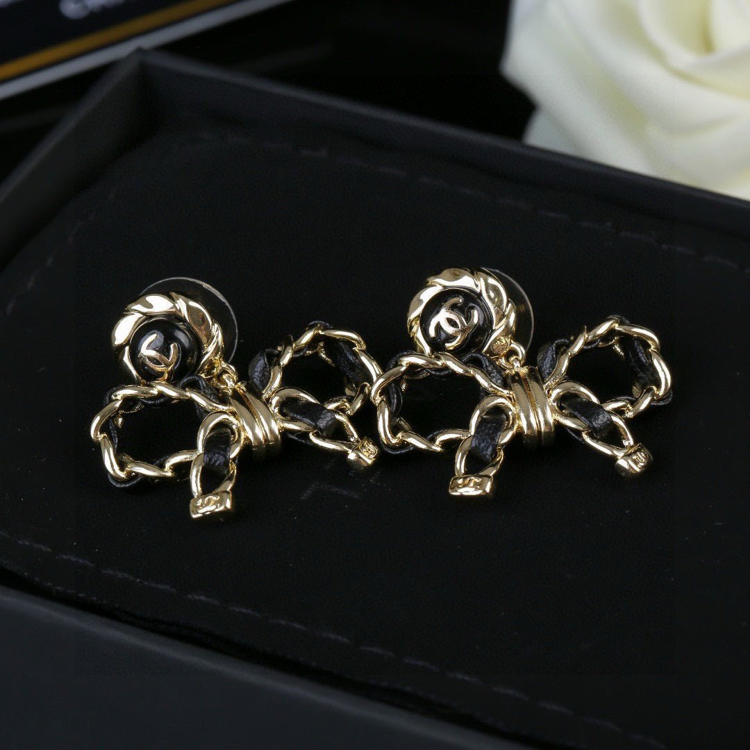 Bow Statement Earrings in Polished Metal-Tone – Design 001 detail view