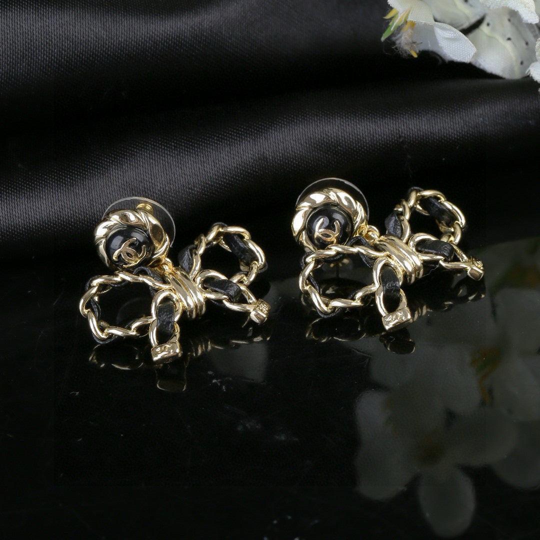 Bow Statement Earrings in Polished Metal-Tone – Design 001 side detail