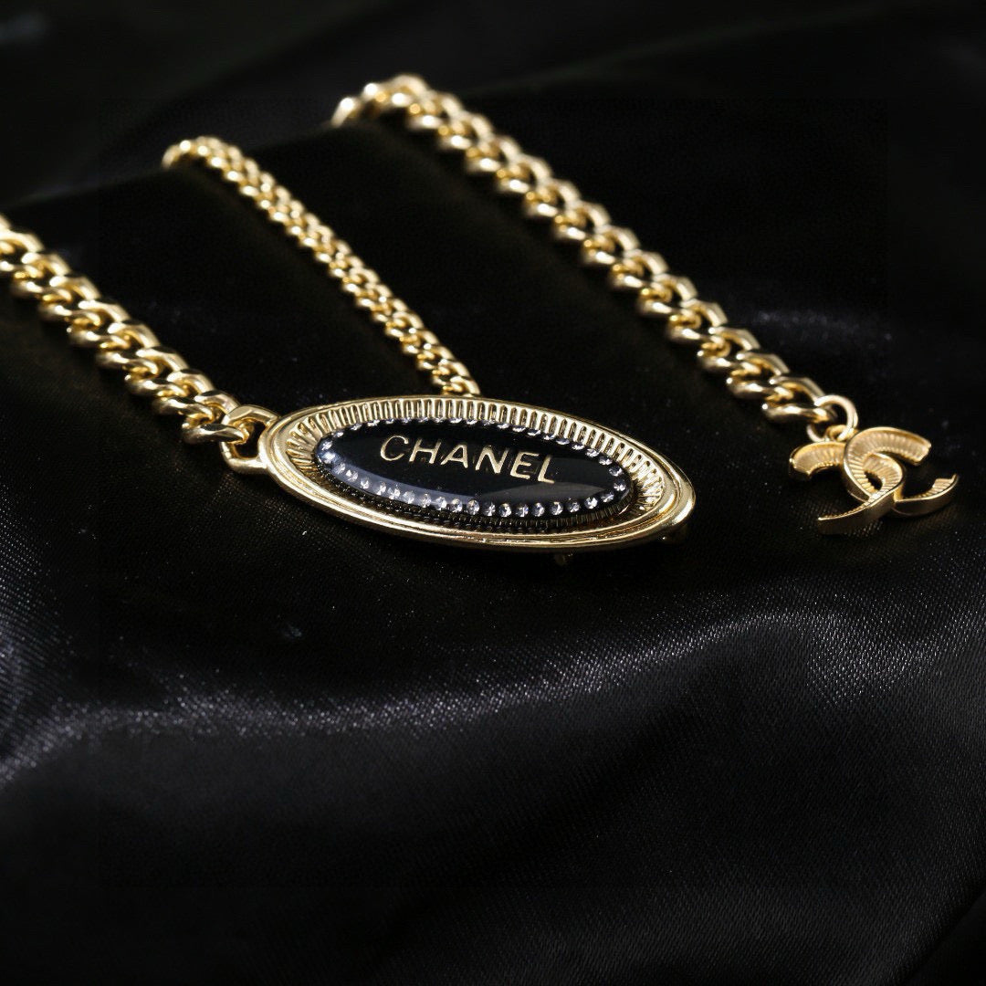 Signature Emblem Jewelry Accessory in Polished Metal-Tone – Design 051 front product view