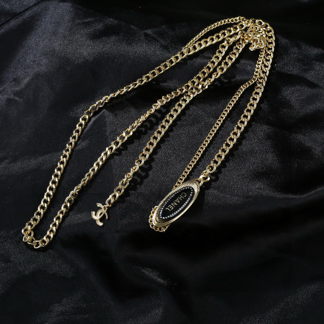 Signature Emblem Jewelry Accessory in Polished Metal-Tone – Design 051 close-up detail