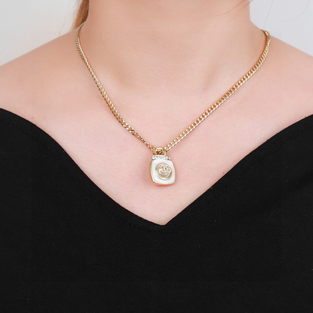 Double-C Emblem Pendant Necklace in Gold-Tone – Design 016 styled product view