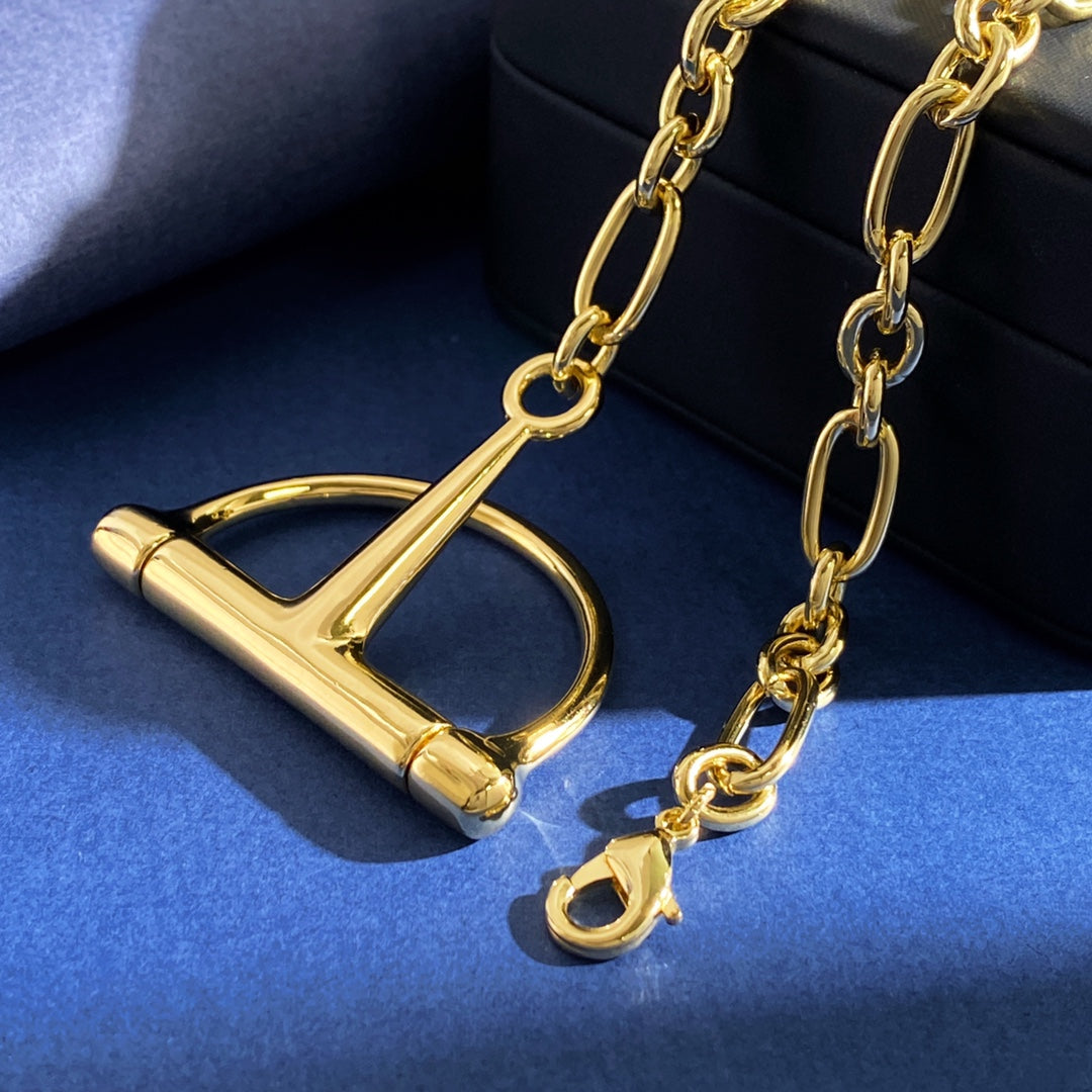 Chain Pendant Necklace in Gold-Tone – Horsebit Detail detail view