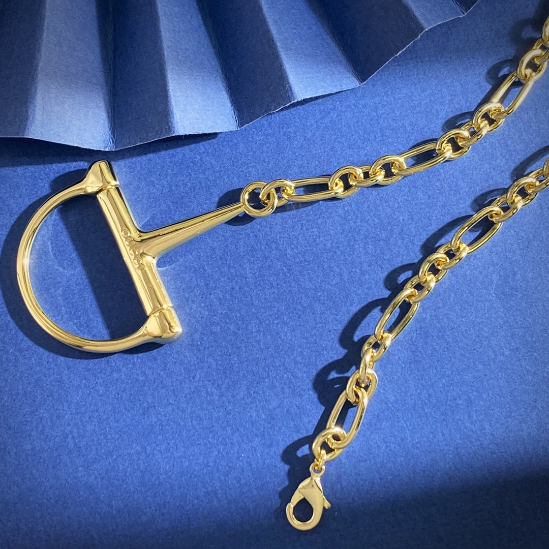 Chain Pendant Necklace in Gold-Tone – Horsebit Detail styled product view