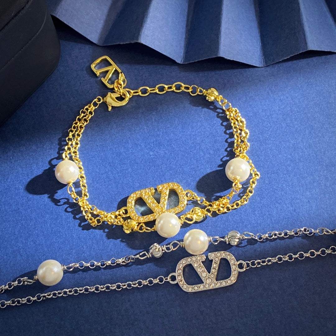 V Emblem Jewelry Accessory – White main product view