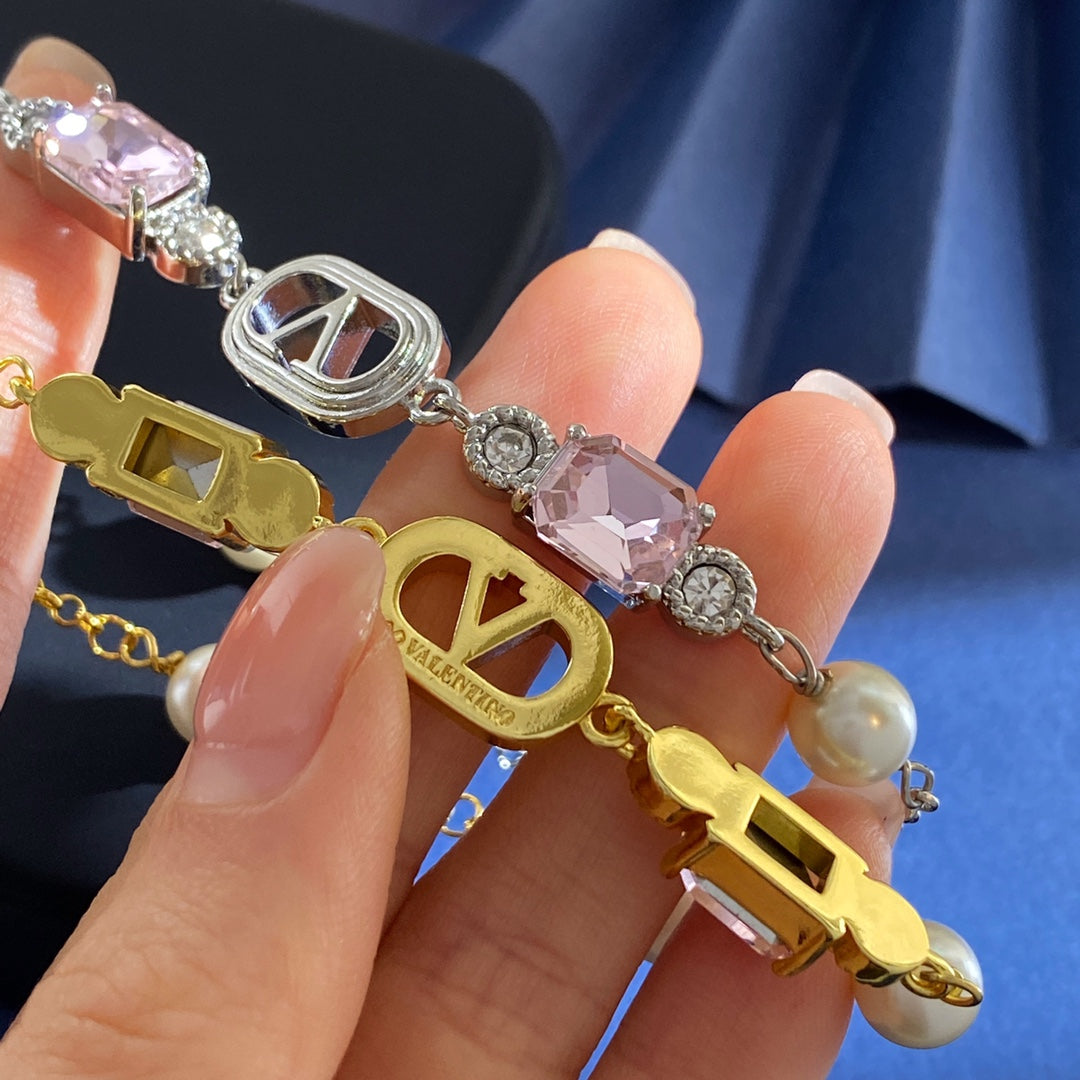V Emblem Crystal-Accent Bracelet – Pink styled detail