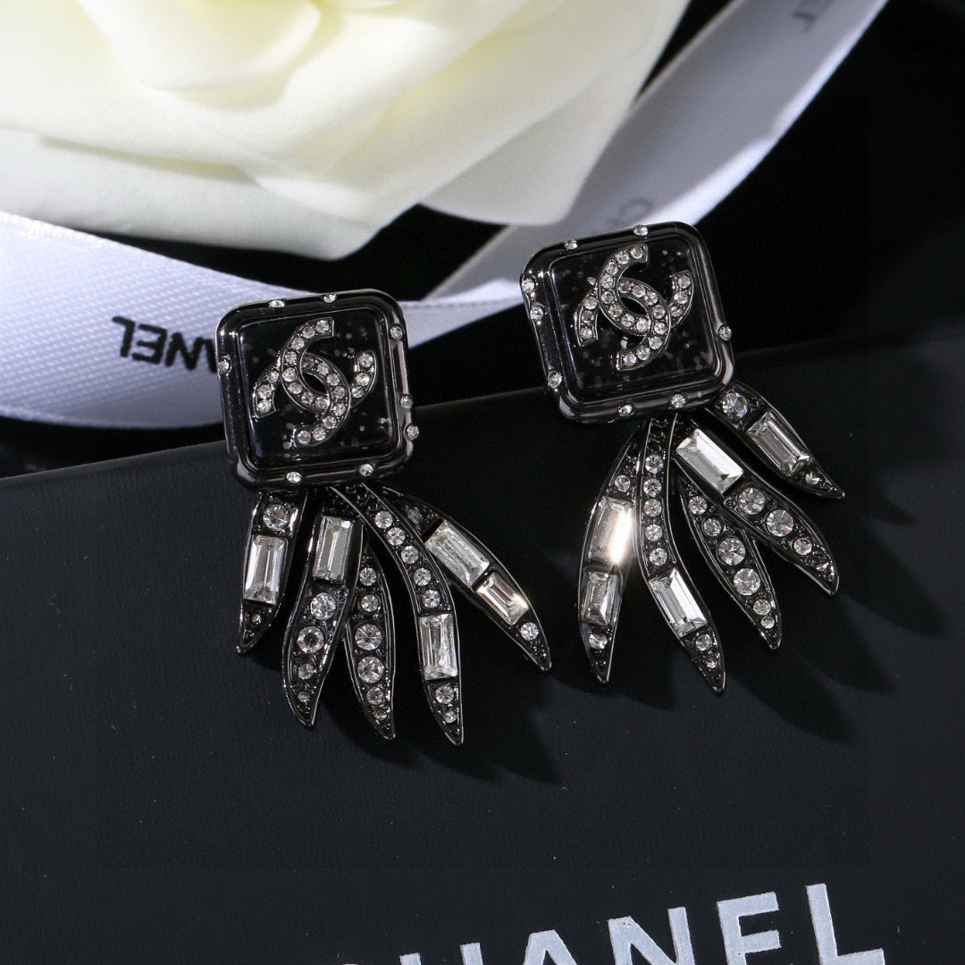Double-C Emblem Stud Earrings in Gold-Tone – Design 033 close-up detail