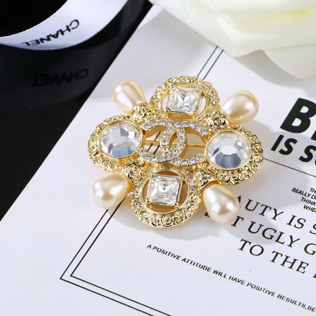 Signature Emblem Brooch in Polished Metal-Tone – Design 043 front product view
