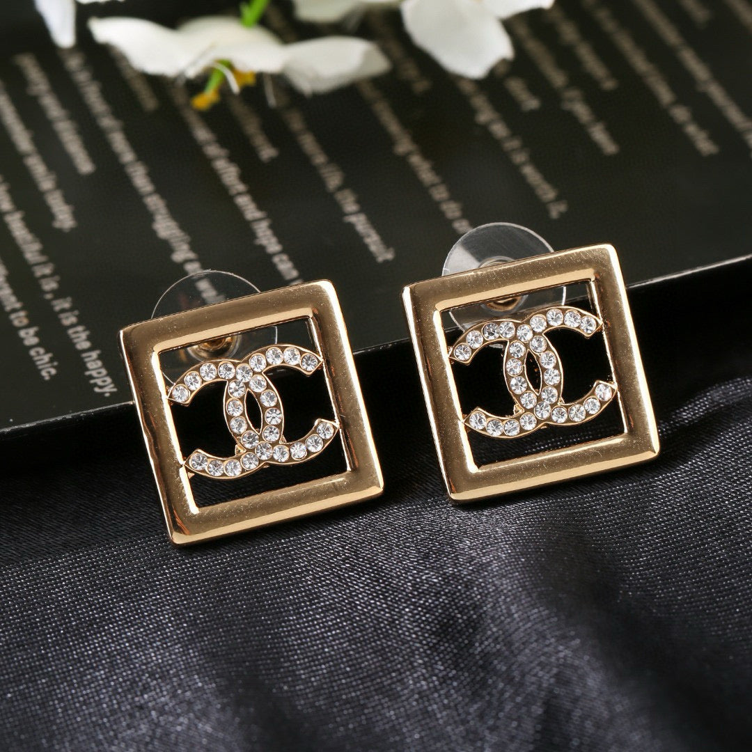 Double-C Emblem Stud Earrings in Gold-Tone – Design 018 close-up detail