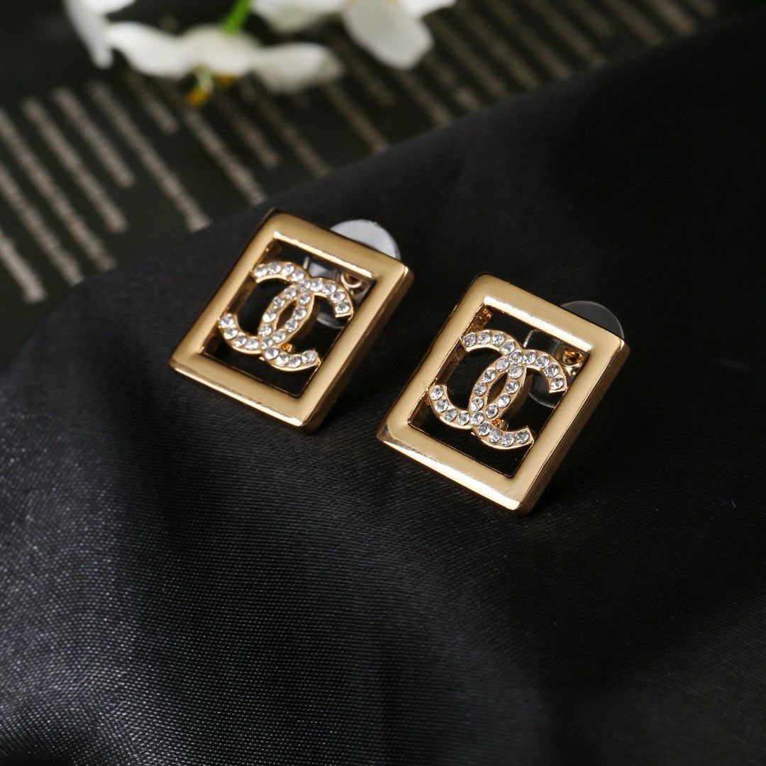 Double-C Emblem Stud Earrings in Gold-Tone – Design 018 styled product view